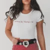 Put It On The Cowboys Tab Graphic Short Sleeve Babydoll Cropped Tee