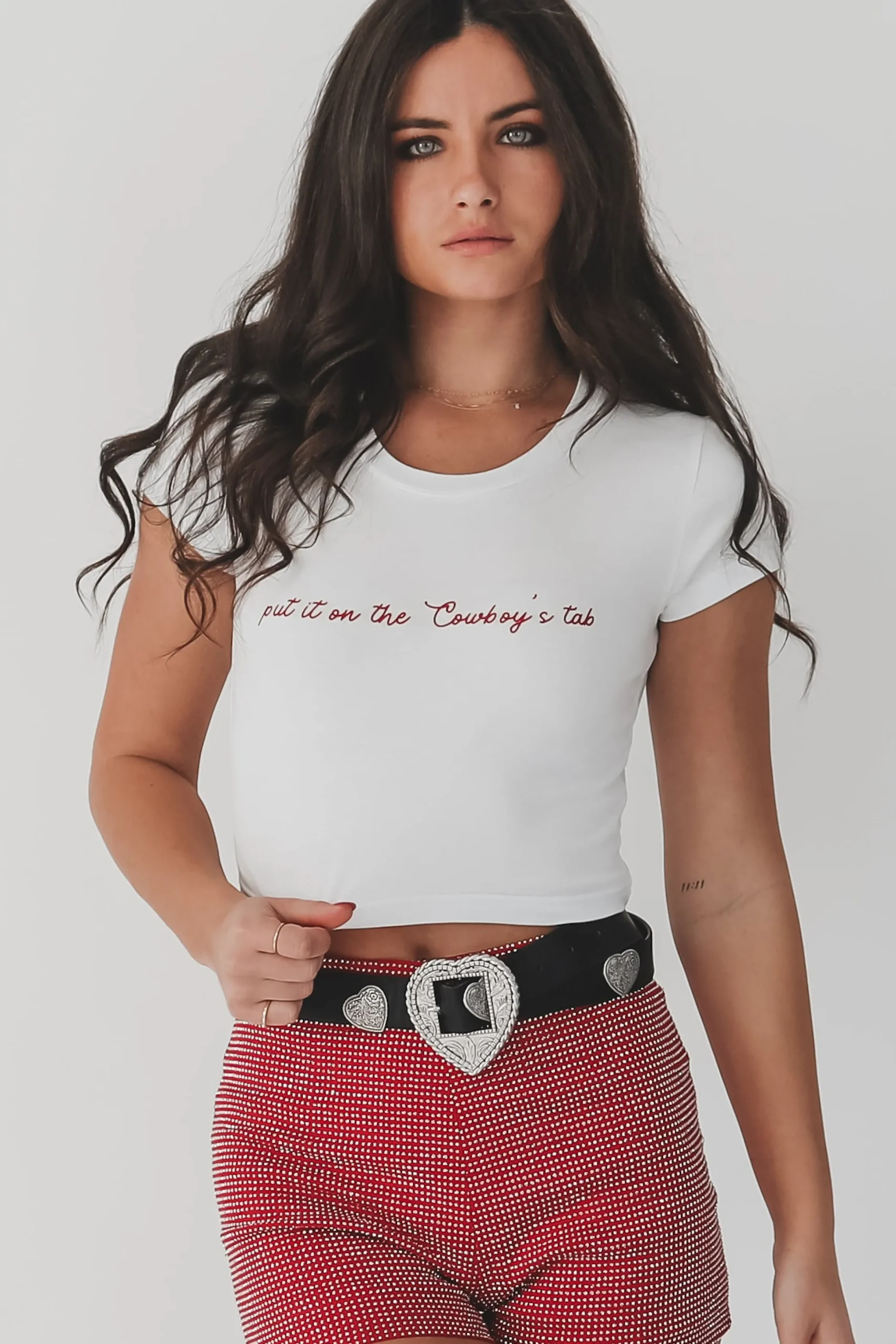 Put It On The Cowboys Tab Graphic Short Sleeve Babydoll Cropped Tee
