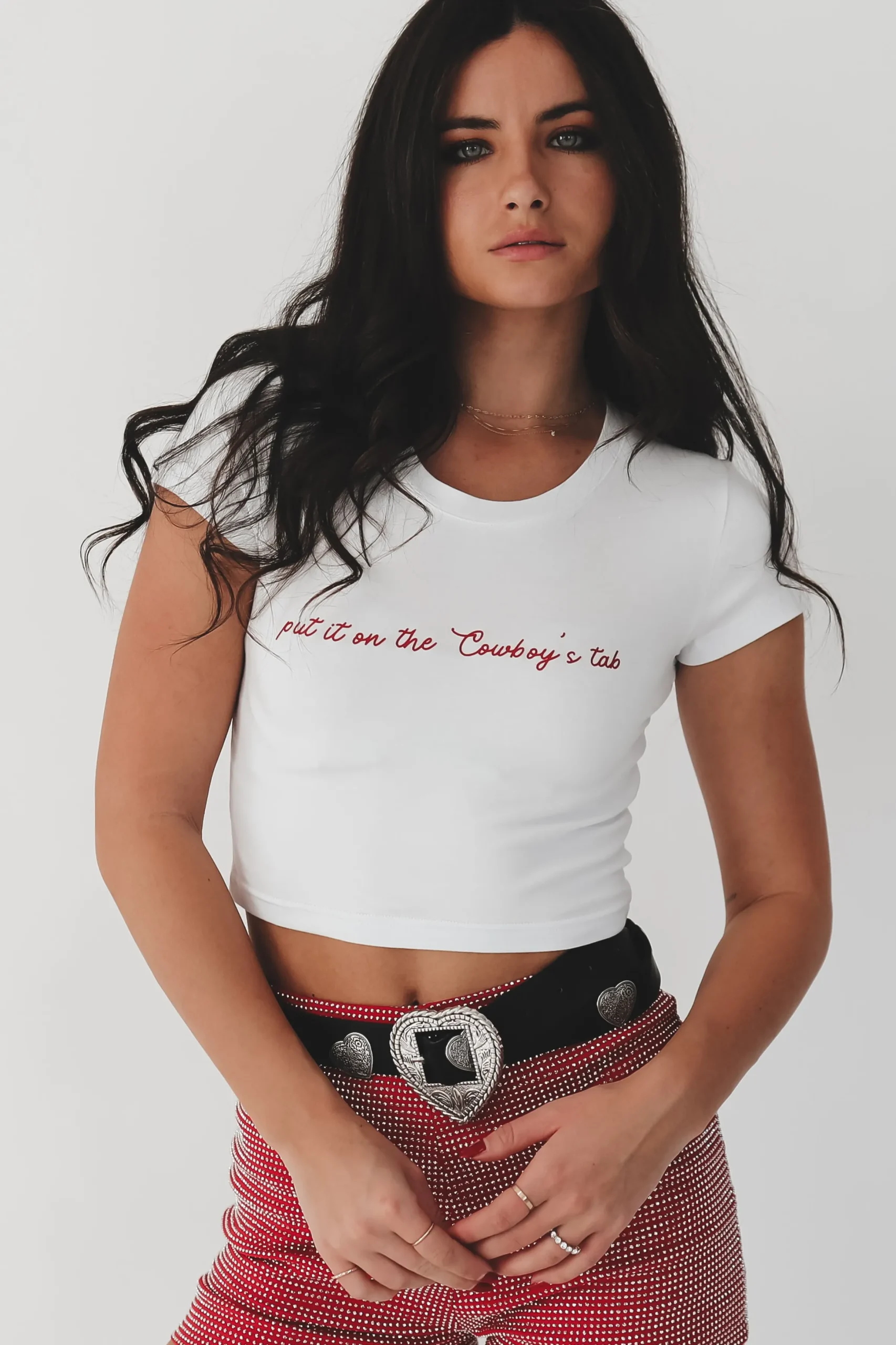 Put It On The Cowboys Tab Graphic Short Sleeve Babydoll Cropped Tee